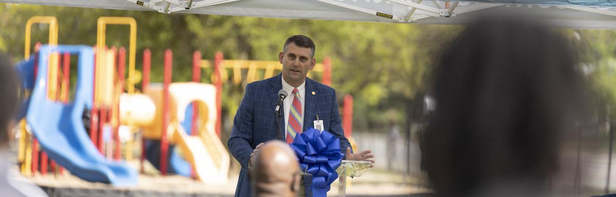 Mayor speaking at Lemira ribbon cutting ceremony