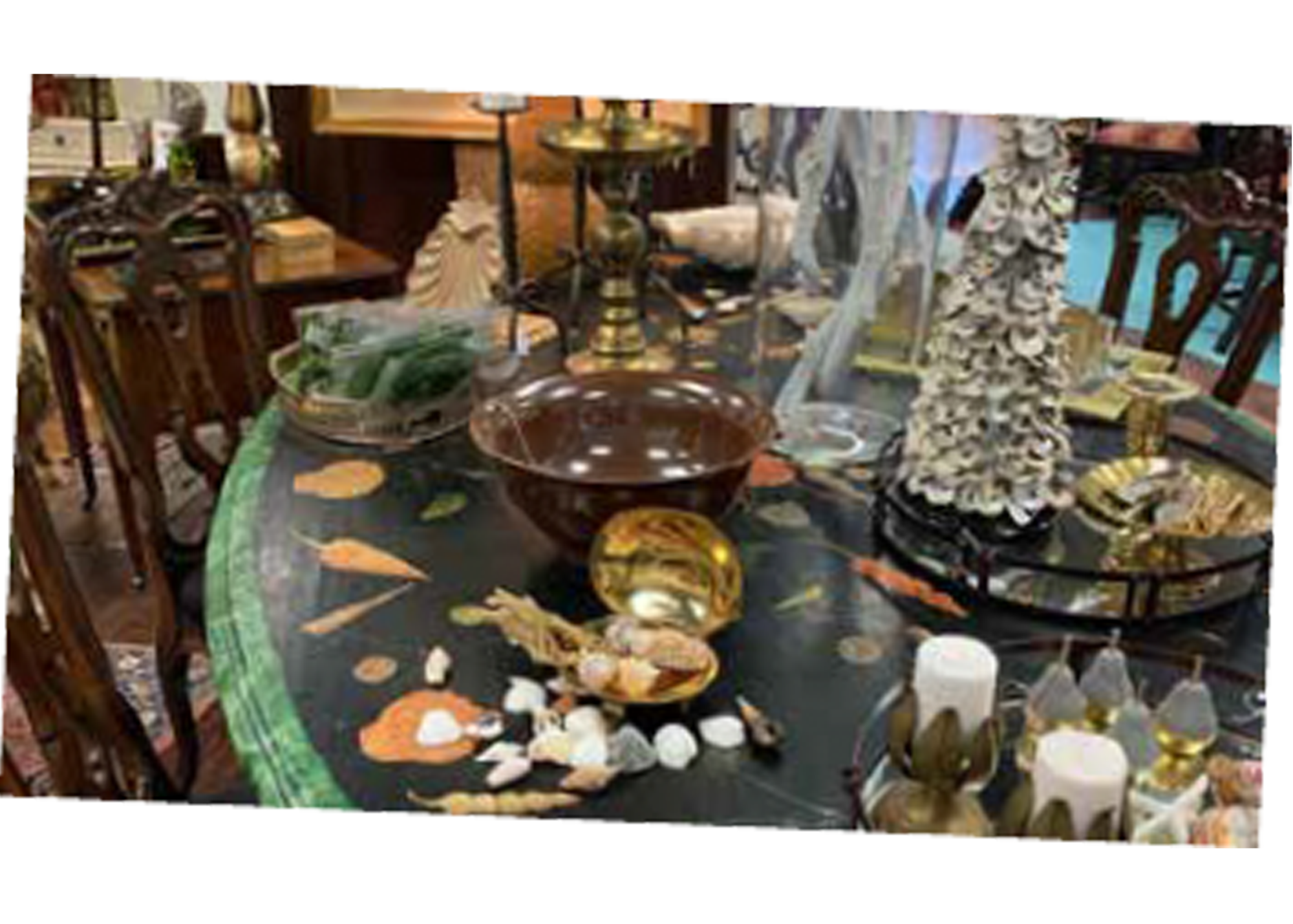Antique table with antique place settings and decorations