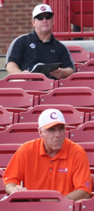 Coaches watching Baseball game