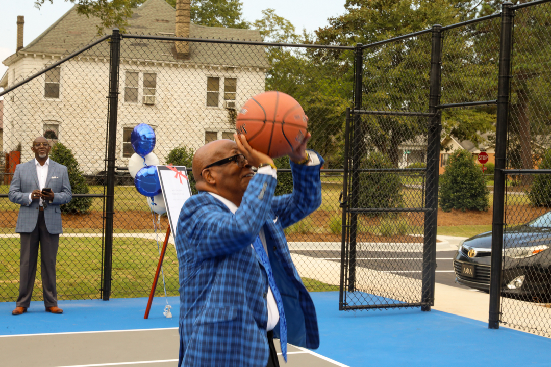 Mayor Pro Temp Blassingame lines up his basketball shot.