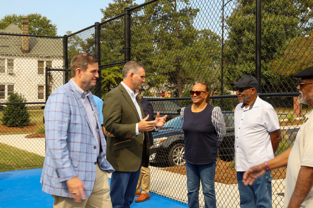 Mayor David Merchant and SPeaker of the House Murrell Smith greet members of the community.
