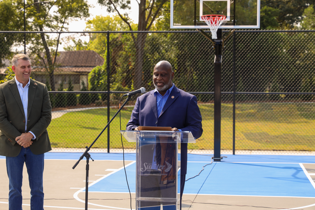 Representative David Weeks speaks about the importance of community parks.